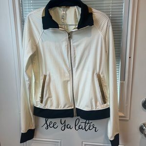 Lululemon jacket.  size 6.  Good condition. Off white. Athletic material.